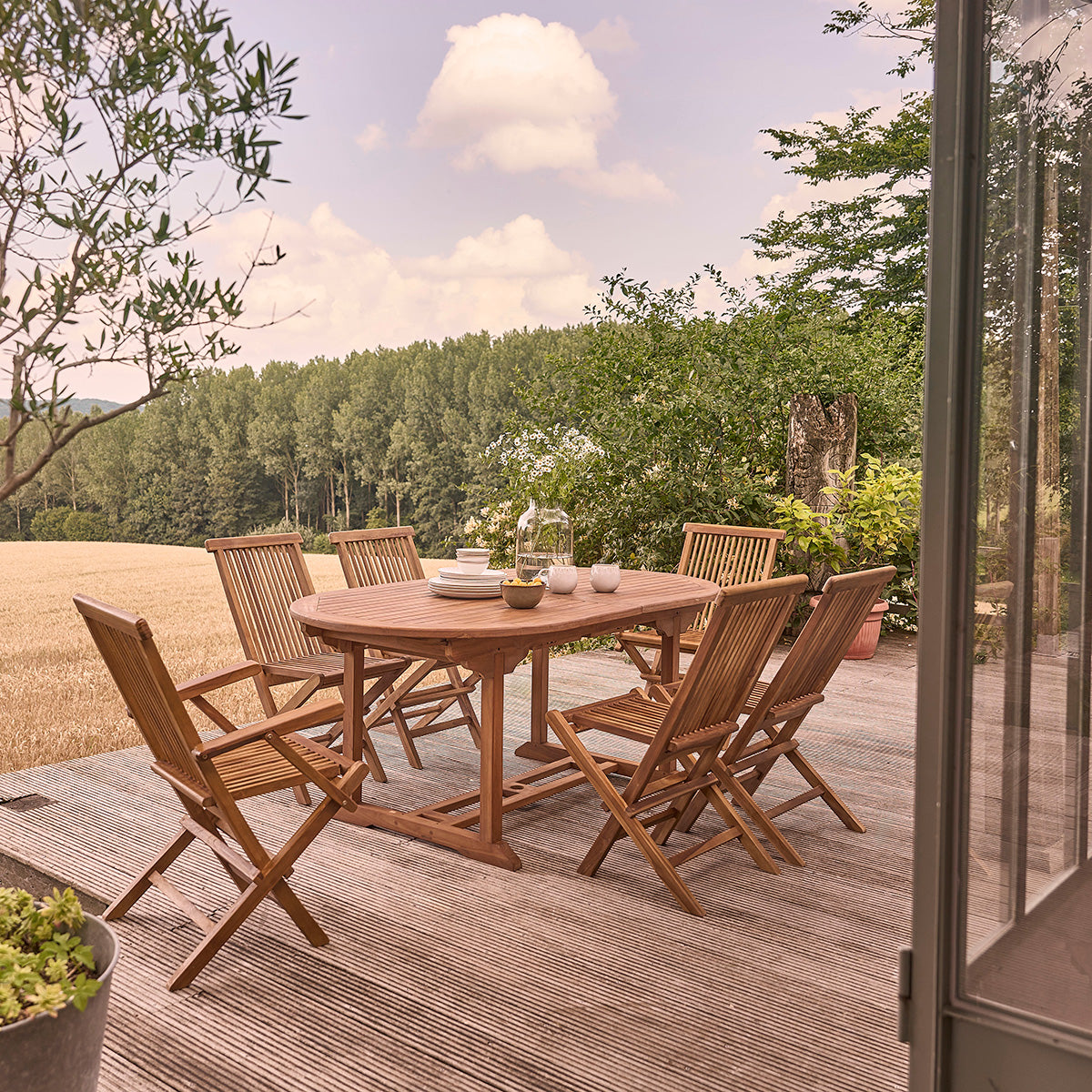 BALI - Salón de exterior extensible de teca maciza aceitada para 8/10 pers.