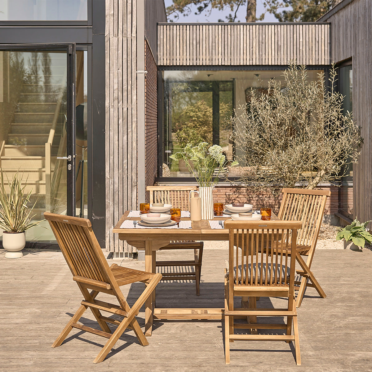 BALI - Salón de exterior extensible de teca maciza aceitada para 4/8 pers.