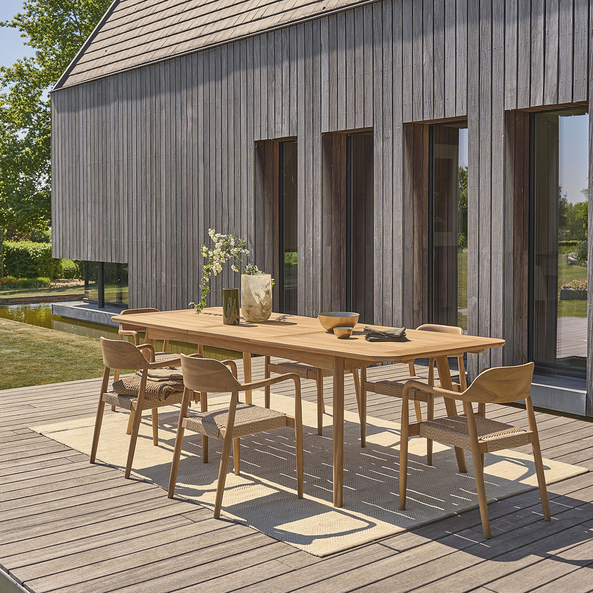 AUBE - Mesa de jardín extensible de teca maciza para 6/8 personas.