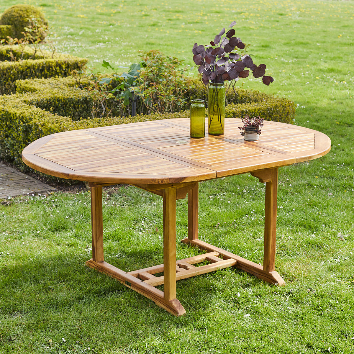 BALI - Mesa de exterior ovalada extensible de teca maciza para 6/8 pers.