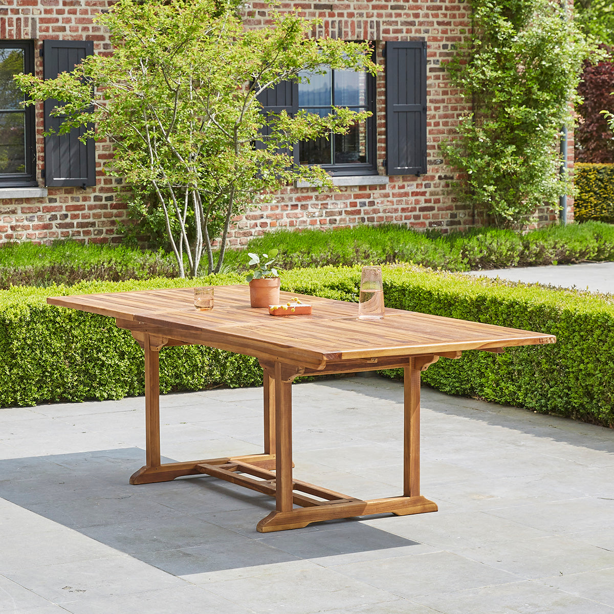BALI - Mesa de exterior extensible de teca maciza aceitada para 8/10 pers.