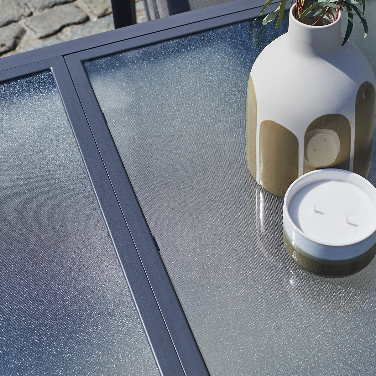 MODULO - Salón de exterior extensible de aluminio gris para 4/8 pers.