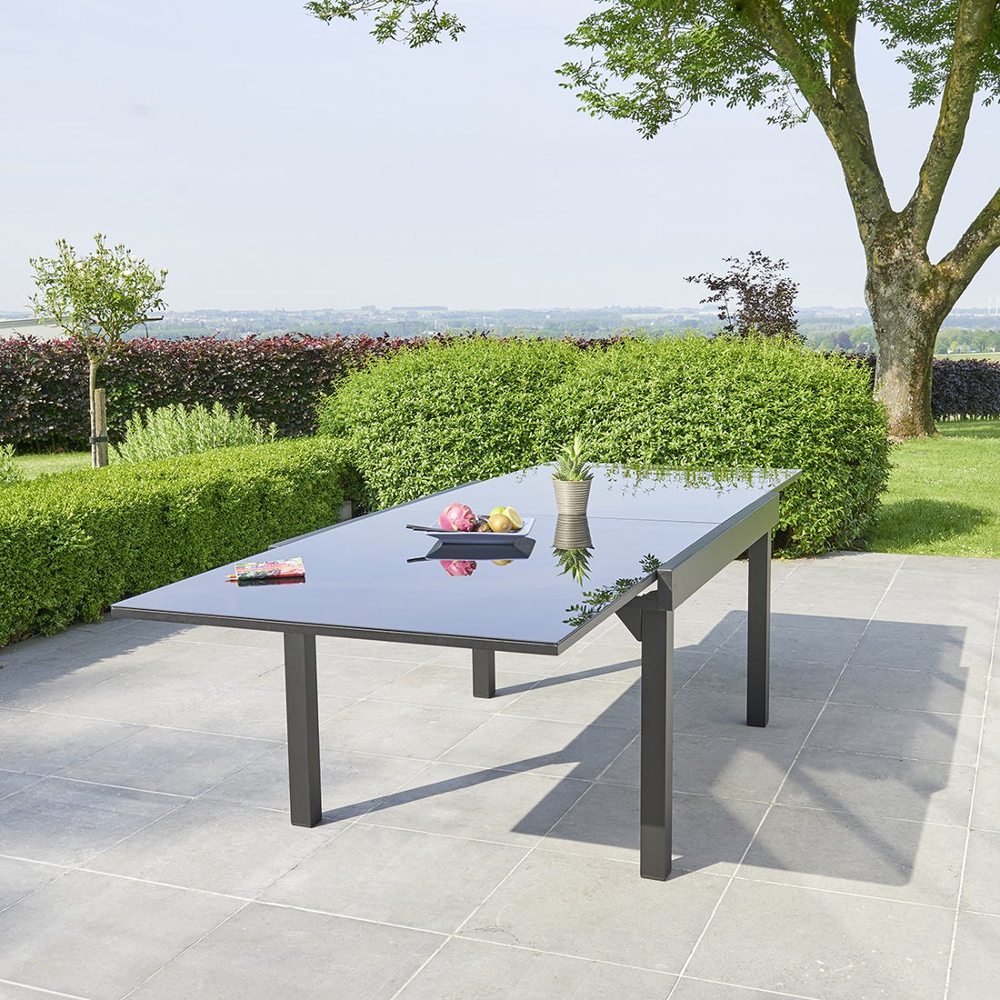 MODULO - Mesa de exterior extensible de aluminio negro para 8/10 pers. MODULO