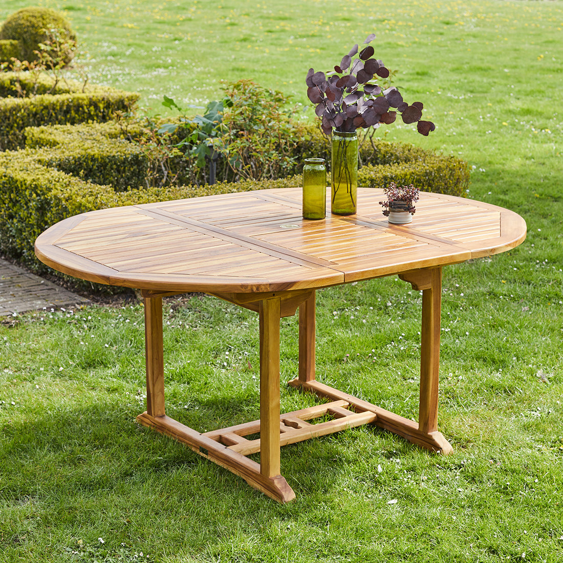 BALI - Mesa de exterior ovalada extensible de teca maciza para 6/8 pers.
