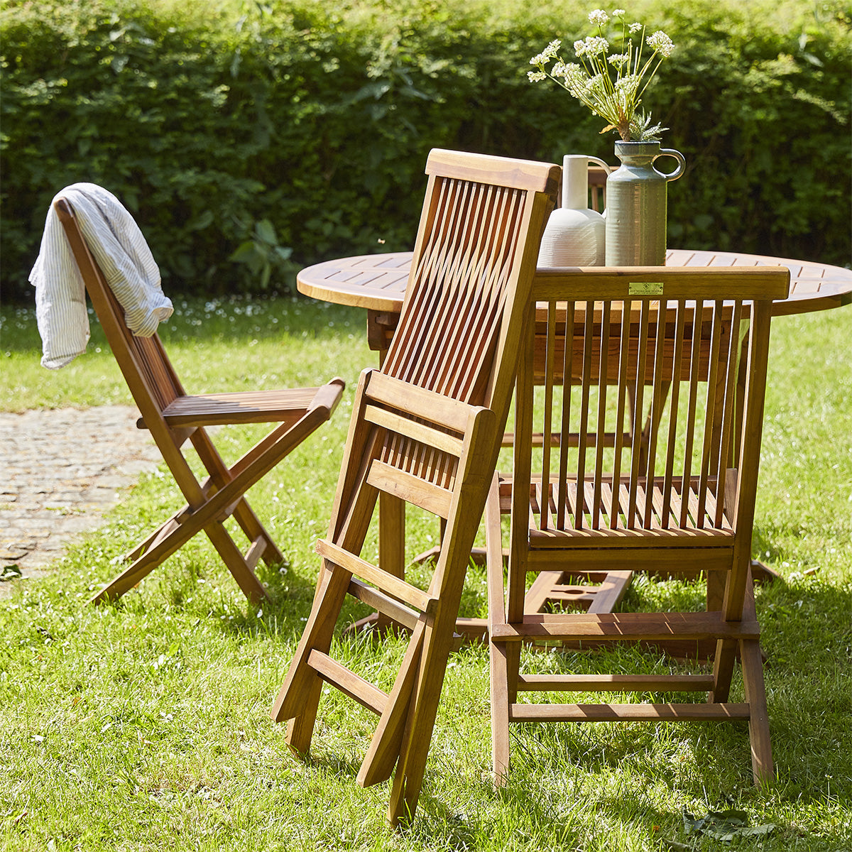 BALI - Salón de exterior extensible de teca maciza aceitada para 6/8 pers.