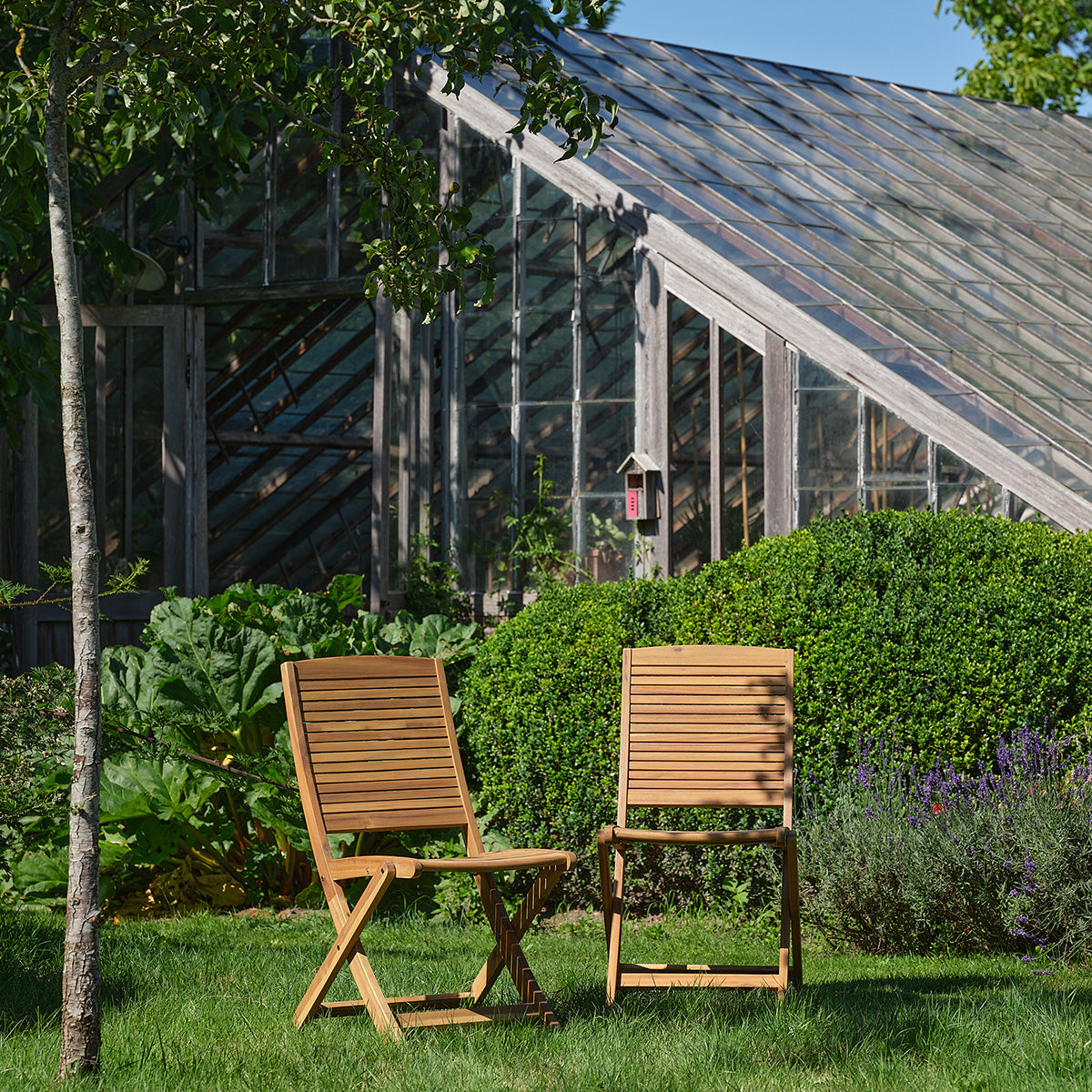 MILOS - Silla de jardín plegable de madera maciza de acacia aceitada (juego de 2)