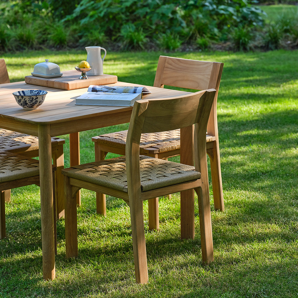 PIANA - Conjunto de jardín de teca maciza y ratán para 4 personas.