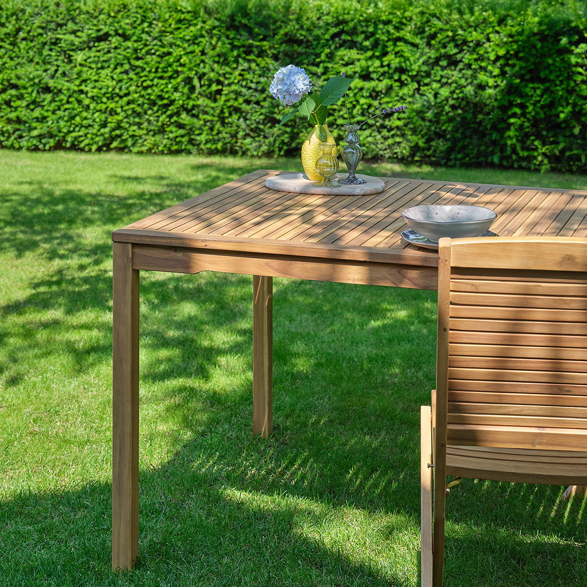 MILOS - Mesa de jardín de madera maciza de acacia aceitada, 150 cm