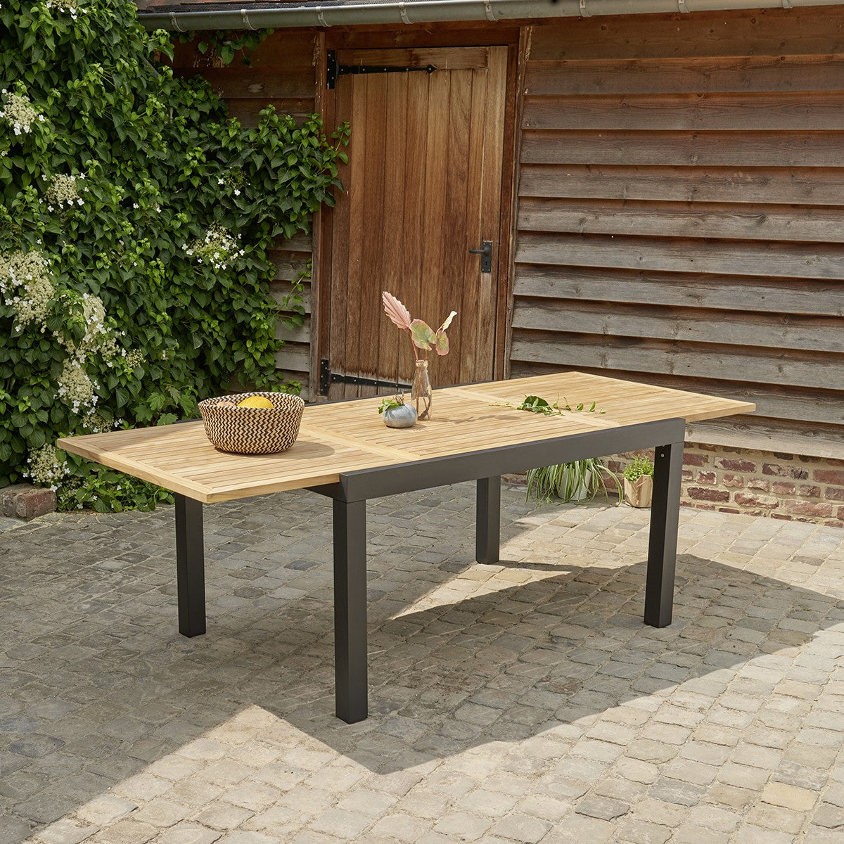 BALITECK - Mesa de exterior extensible de aluminio y teca para 6/10 pers.
